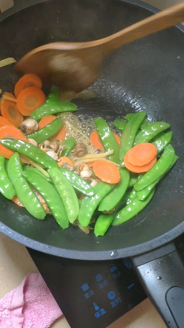 荷蘭豆炒螺肉的做法-家常味炒菜譜
