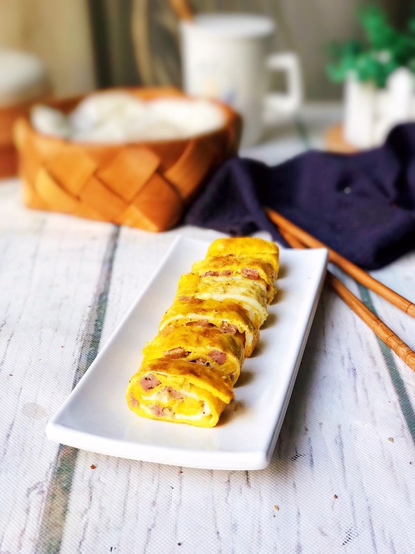 香腸雞蛋卷的做法-咸鮮味煎菜譜-易網(wǎng)健康養(yǎng)生網(wǎng) 香腸雞蛋卷的做法-咸鮮味煎菜譜