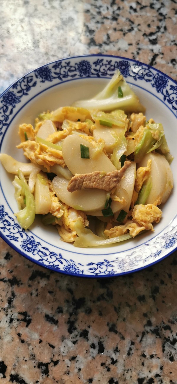 卷心菜炒年糕的做法-家常味炒菜譜-易網(wǎng)健康養(yǎng)生網(wǎng) 卷心菜炒年糕的做法-家常味炒菜譜