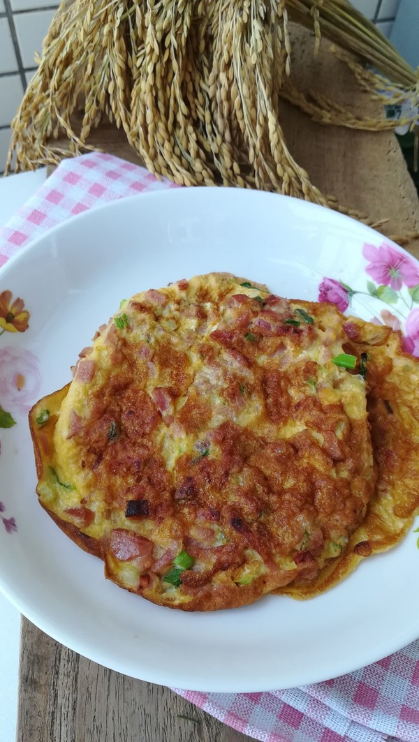 火腿粒煎蛋餅的做法-家常味煎菜譜-易網(wǎng)健康養(yǎng)生網(wǎng) 火腿粒煎蛋餅的做法-家常味煎菜譜