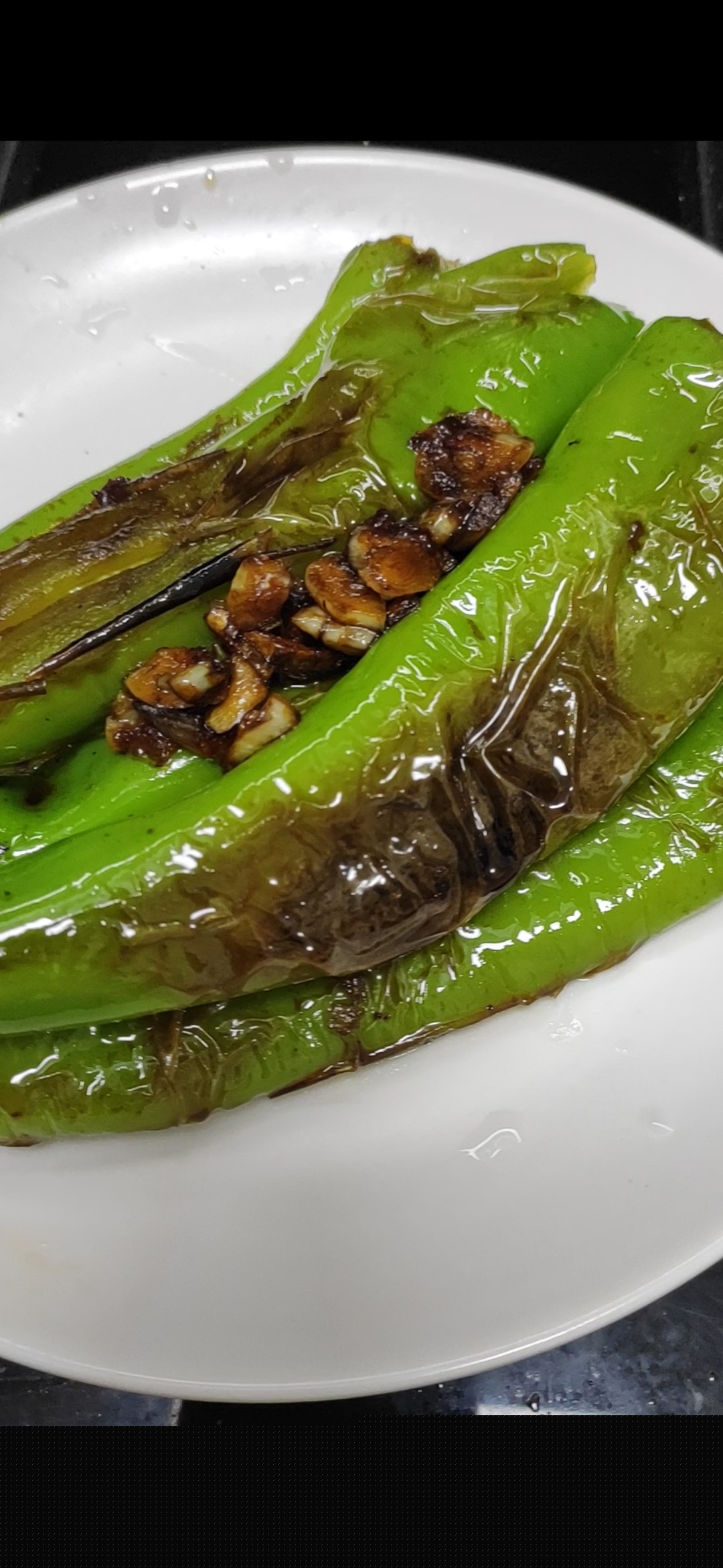 下飯菜虎皮青椒的做法-家常味炒菜譜-易網(wǎng)健康養(yǎng)生網(wǎng) 下飯菜虎皮青椒的做法-家常味炒菜譜