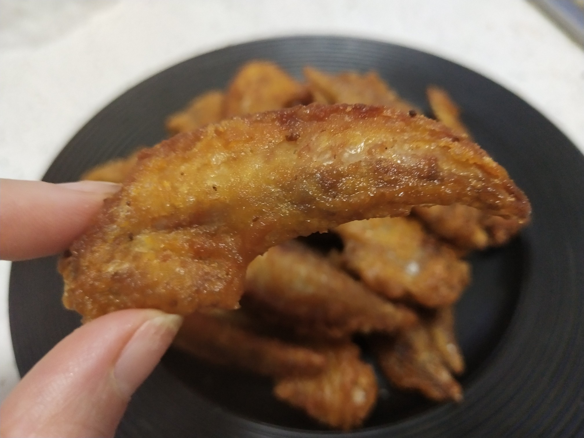 飄香酥炸雞翅尖的做法-家常味炸菜譜-易網(wǎng)健康養(yǎng)生網(wǎng) 飄香酥炸雞翅尖的做法-家常味炸菜譜