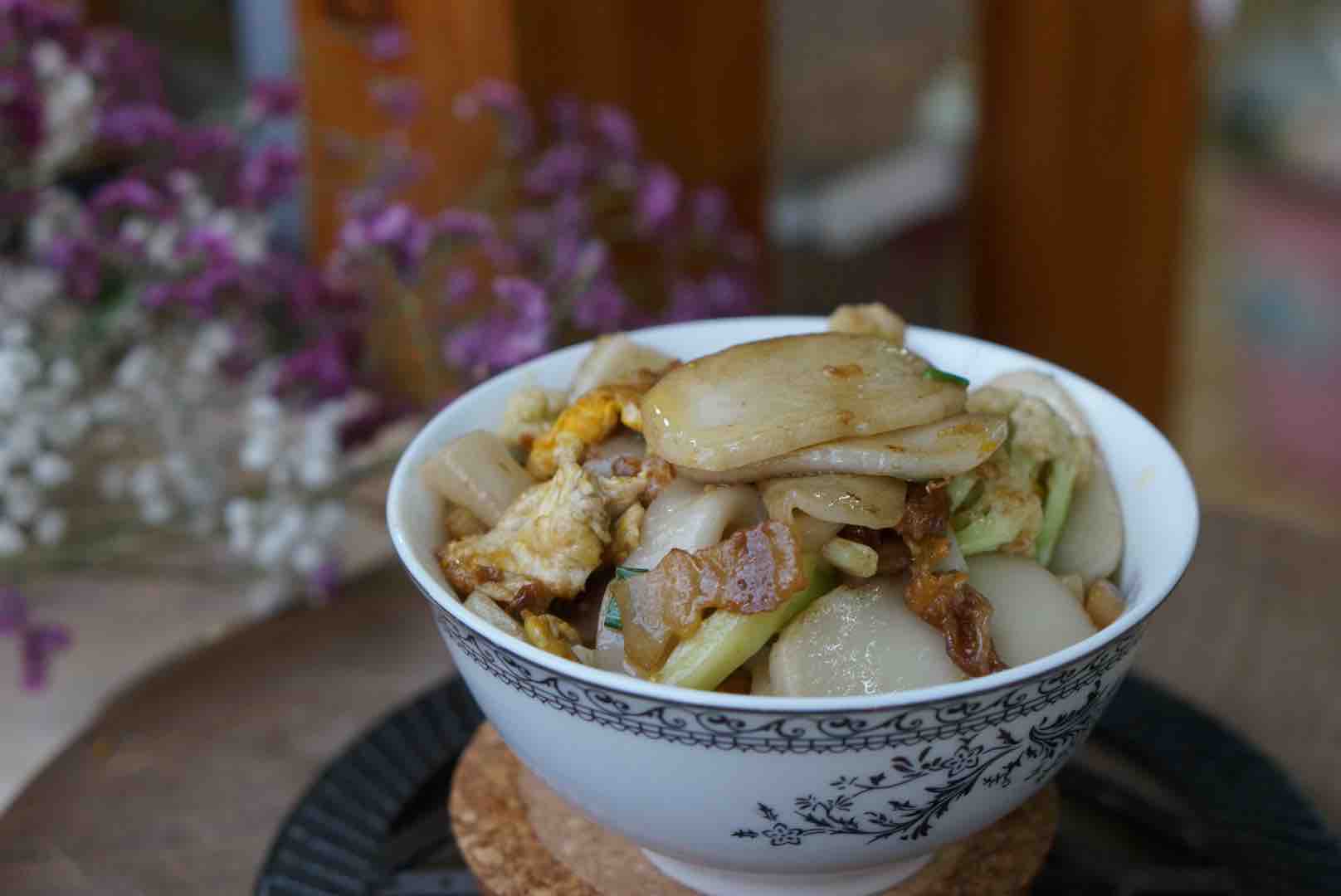 油渣花菜炒年糕的做法-家常味炒菜譜