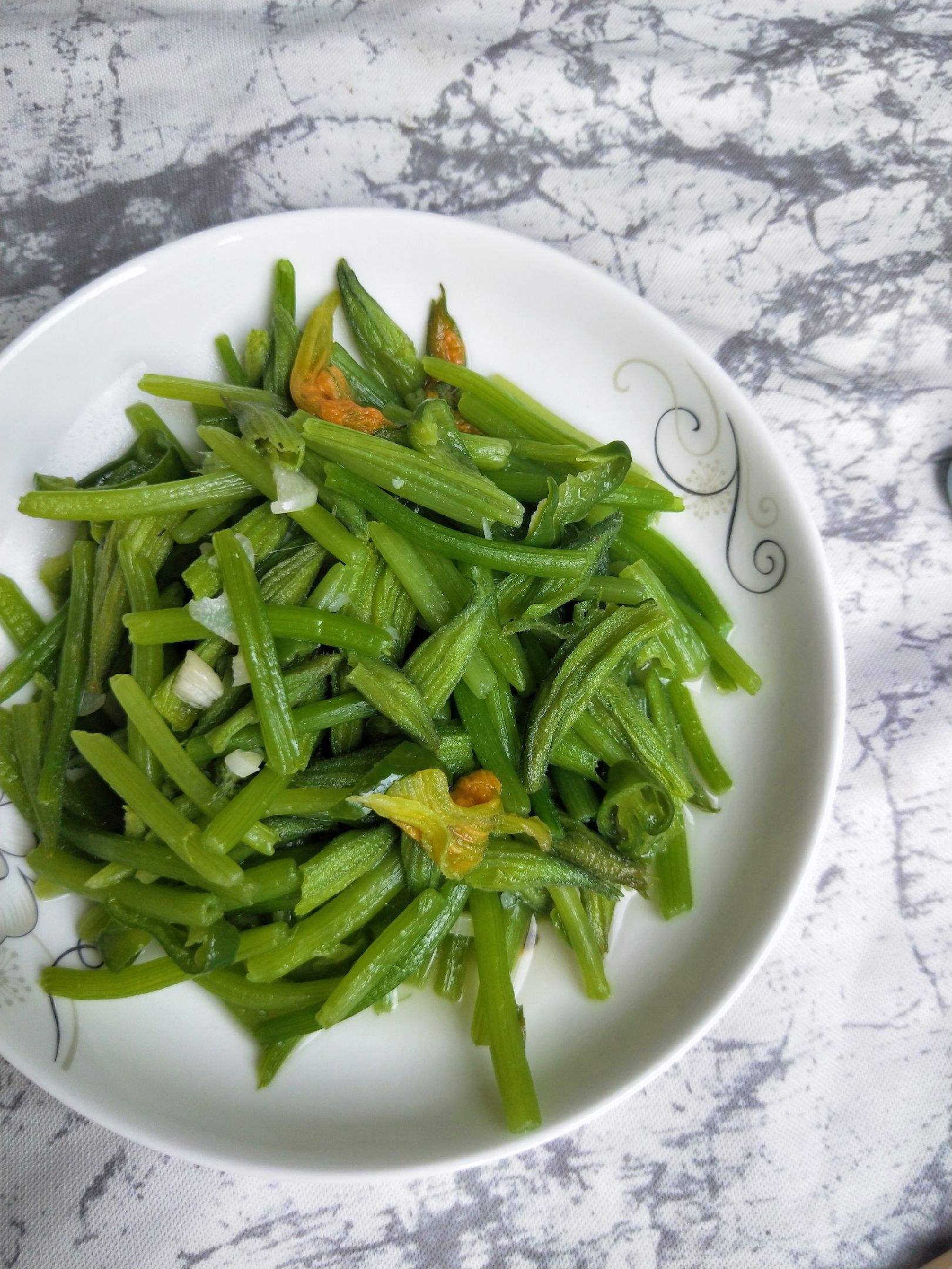 蒜香南瓜花的做法-家常味炒菜譜-易網健康養生網 蒜香南瓜花的做法-家常味炒菜譜