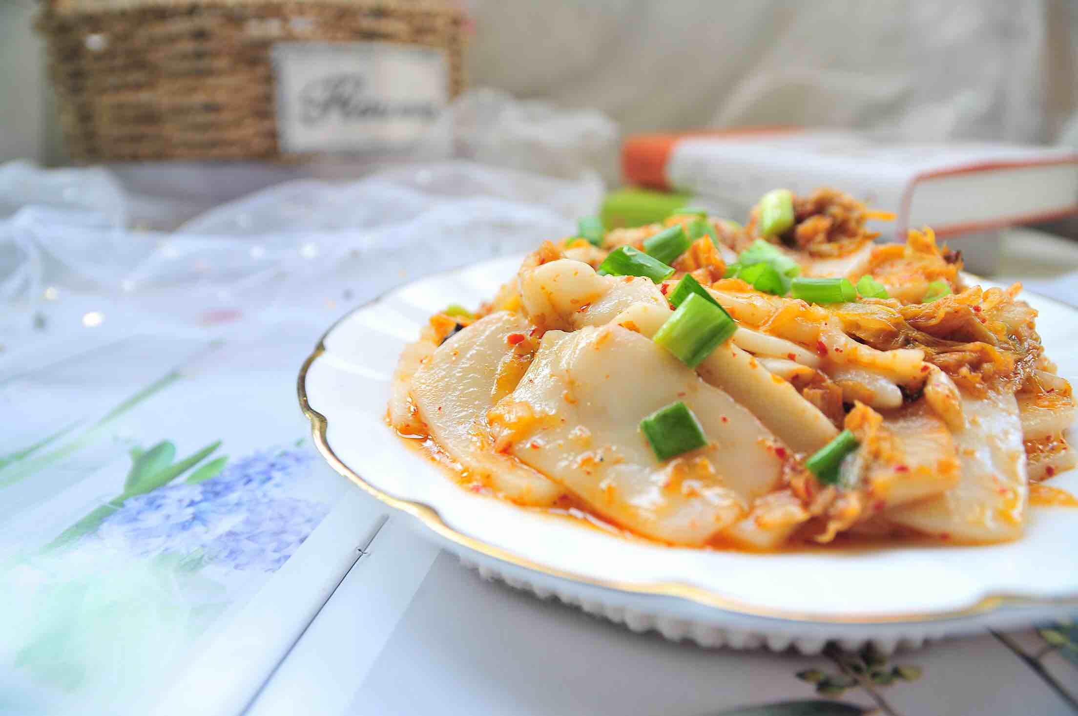 辣白菜炒年糕的做法-家常味炒菜譜-易網健康養(yǎng)生網 辣白菜炒年糕的做法-家常味炒菜譜